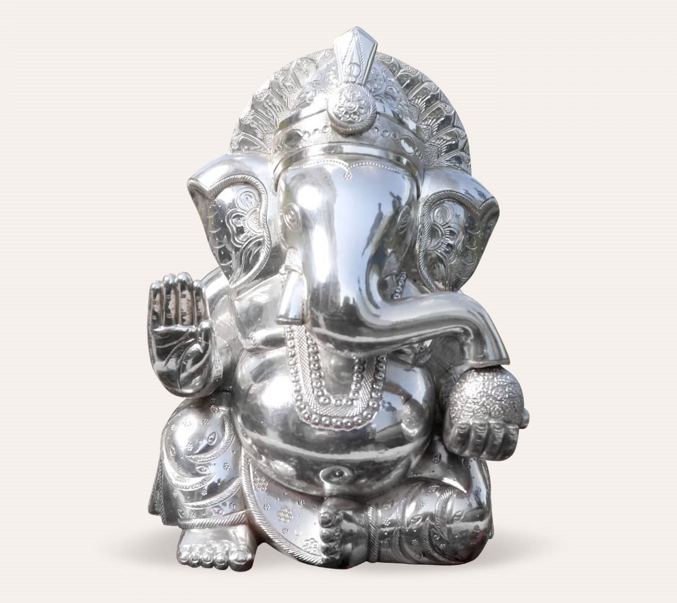 Elegant Silver God Idol of Lord Ganesha symbolizing wisdom and success.