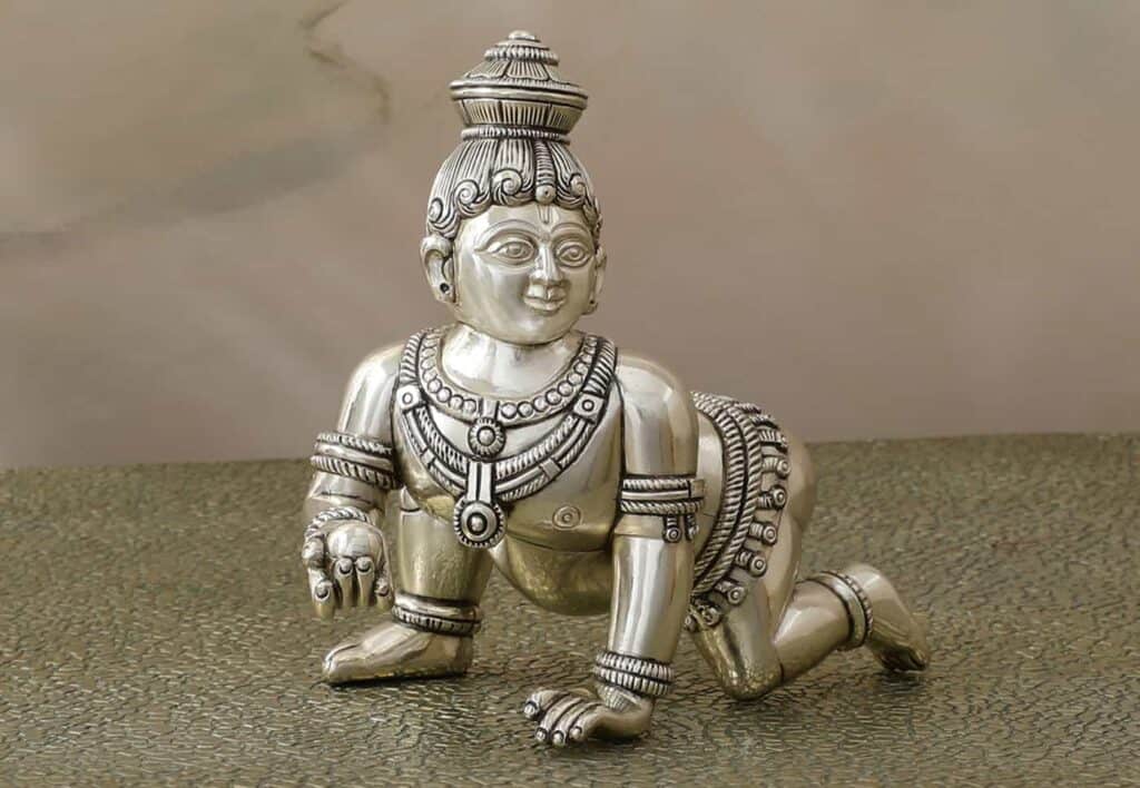 Explore Ideal Silver God Idol of Ladoo Gopal depicting divine innocence.