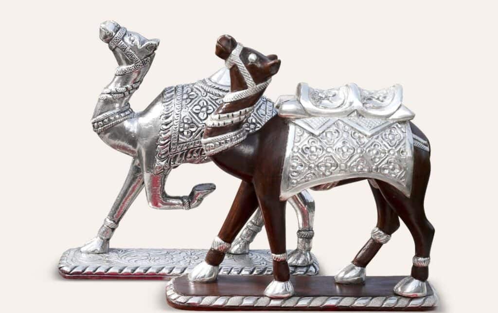 Explore Luxury Silver Showpieces: Intricate Silver Camel sculpture.